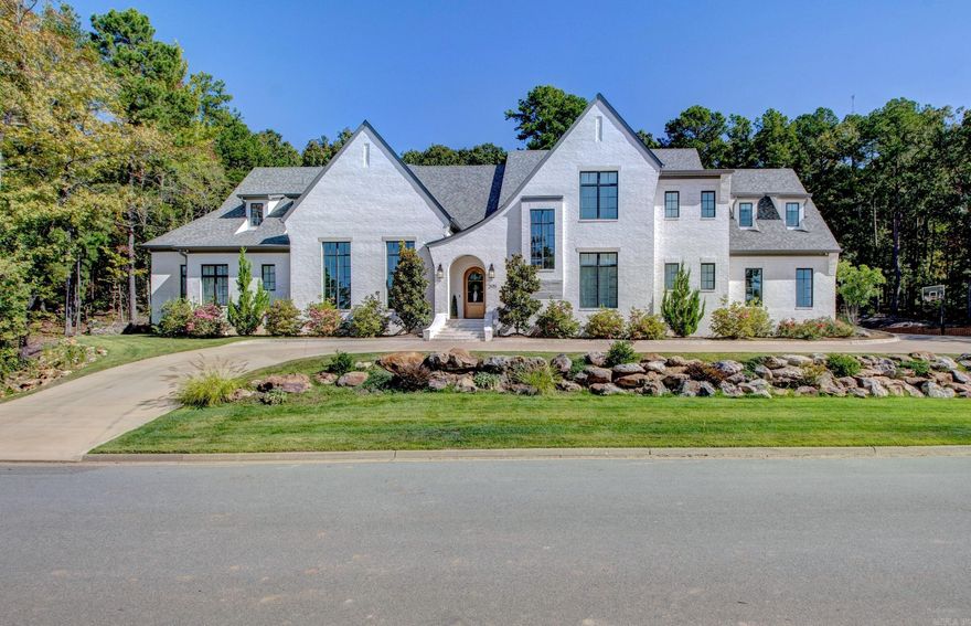 CUSTOM DESIGNED, EXTRAORDINARY PROPERTY!  This home is perfectly situated on .74 acres in Bear Den Estates and has 3 sides greenbelt for wonderful privacy.  You will love the outdoor entertaining it offers with its beautiful in-ground Gunite, salt-water pool and spa, outdoor shower and separate pool bath access  The detailing inside is something special and you will definitely want to see!  Stunning entry leads you into the DREAM kitchen with massive island, two dishwashers, AMAZING pantry with icemaker and beverage fridge and tons of cabinets.  The kitchen overlooks the serene, backyard pool area.  The Great Room is very spacious and has site-built WB fireplace and a wall of built-ins.  Two wonderful dining areas and a separate HVAC controlled wine room.  Primary suite is tucked in the back and has a lovely en-suite bath with expansive closet.  Main level also offers a separate office space, Guest Bedroom w/private bath, powder room, a wonderful laundry room w/super convenient pet feeding station with brick floors and built-in gate for separation.  Upstairs offers 2 additional BR's with private baths, laundry chute, Bonus/Game room and access to tons of storage.  JUST GORGEOUS!