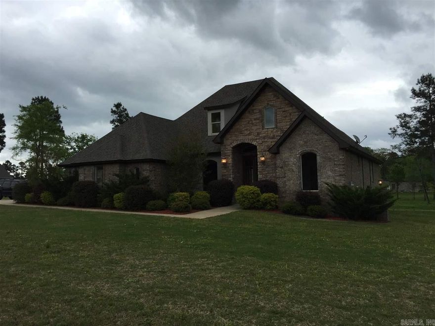 This site sets on 1.57 Acres with great views from front to back. 3 Car garage, grand front entry doors.  Formal dining area, gourmet kitchen with large pantry, open floor plan.  Hardwoods in main living areas, ceramic tile in wet areas, carpet in bedrooms and bonus room. Plenty of room in master bedroom, spacious master bath with separate shower and bath tub.