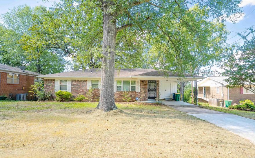 Charming Park Hill home with original hardwood floors in excellent condition. Fresh paint throughout interior and carport and a remodeled bathroom. Large, updated kitchen features stainless steel appliances (side-by-side refrigerator), quartz countertops, pantry and breakfast bar. Ceiling fans with updated lighting, vinyl windows/doors, and washer & dryer convey. Large backyard with storage building. Seller offers a home warranty. Measurements approximate — measure for accuracy; buyer to verify.