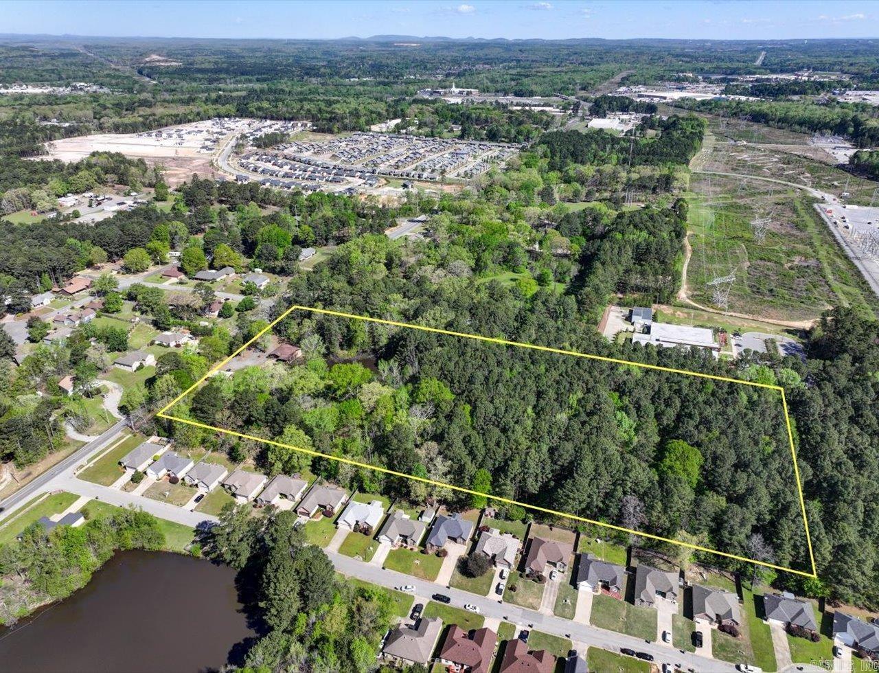 Large tract of 10 acres located within a mile from the Amazon Distribution warehouse. Extreme growth in the area both industrial and multi-family. Tract is currently zoned residential and does have a small home and shop but has commercial zoning capability. 1.3 Miles to Interstate I-30 for easy access to the freeway.