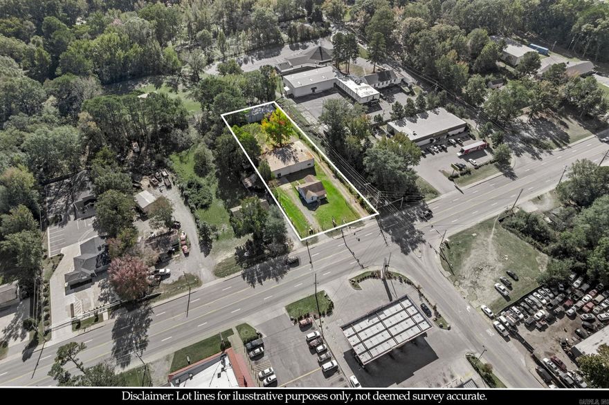 Unique commercial opportunity with endless potential in a high-traffic SW location. Zoned C-3, this income-producing property includes three buildings across 4919, 4921, and 4923 Baseline Rd, ideal for investors, business owners, or organizations seeking flexible space.  The first building is a detached 3-bedroom, 1-bath home featuring tile and wood flooring, plus central heat and air—perfect for rental income or on-site living. The second building is a spacious event center, gymnasium, or worship hall with men’s and women’s public restrooms, two office spaces, and a full kitchen, making it suitable for gatherings or business use.  The third building is a metal structure that can be used as a warehouse, storage facility, or other commercial purpose. With multiple structures and strong visibility, this property offers excellent potential for multi-use income streams or business expansion.