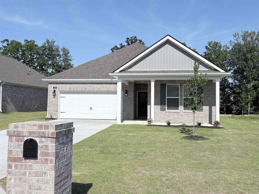 MOVE-IN READY! The appealing one-story home includes many contemporary features.  An open-concept design including 9' ceilings enhance the wonderful feel of this home. The kitchen includes a large counter perfect for bar-style eating or entertaining, a spacious pantry and plenty of cabinets and counter space. The large living room overlooks the patio, which is a great area for relaxing and dining al fresco. Bedroom One, located at the back of the home for privacy, can comfortably fit a nice size bed, and includes an en suite bathroom with a vanity and big walk-in closet. Pictures, photographs, colors, features, and sizes are for illustration purposes only and will vary from the homes as built. Additional Features include: granite countertops, kitchen appliances provided are refrigerator, stove, microwave, dishwasher, electric fireplace, brick, gutters, blinds, double sinks in master, walk in shower, 2 car garage, 10 year warranty.  Photos are for illustration purposes only.