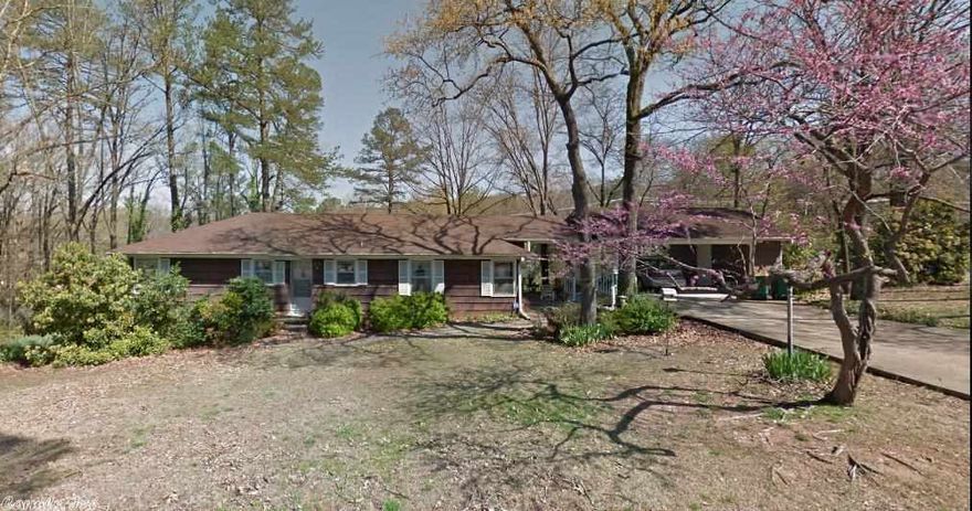 Beautifully remodeled in and out. Nice, quiet, private-feeling road.