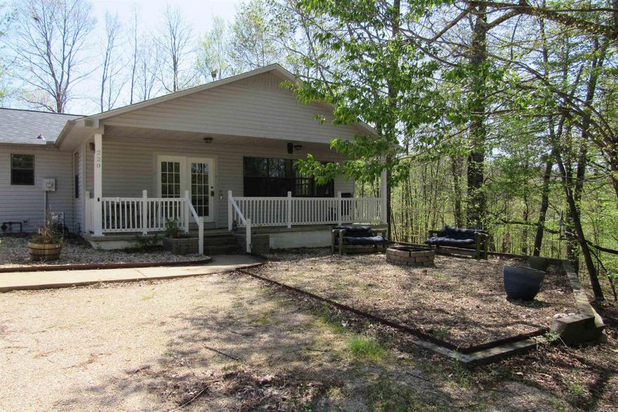 Located in a private location on top of a hill surrounded by acres of trees.  Recently remodeled with a new roof 2023. One level, 3 bedroom 2 bath ,LVP flooring, granite countertops and stainless steel appliances. Primary bath with tiled shower and jacuzzi tub. There is a outdoor storage building with electricity. Great outside area with fire pit. located in Lakeside SD. Please provide pre-approval letter with any contract.