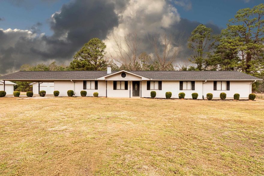 Beautiful 2,712 sq ft home situated on 3 acres between Hermitage and El Dorado. This 3 bedroom, 3 bath property offers spacious living with a large great room perfect for gathering and entertaining. The dedicated 340 sq ft heated and cooled theater/golf simulator building adds a unique bonus space for recreation or relaxation.  Enjoy abundant storage throughout the home, fresh interior paint, new flooring, and updated fixtures in most rooms. The roof is less than 5 years old, giving added peace of mind. With room to spread out both inside and out, this property offers privacy, space, and modern updates in a convenient location.