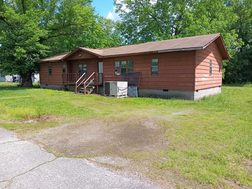 This house has a renovation started but needs a new owner to repair & remodel. Almost all the popcorn ceiling has been removed & is ready for construction loan or cash offer. No utilities are on or will be turned on by seller. Seller is selling "As is" so it is priced as a true fixer-upper. The house needs a new roof & is plumbed for 1 bath but has the space to be a 3 bedroom, 2 bath.  Agents see agent remarks.