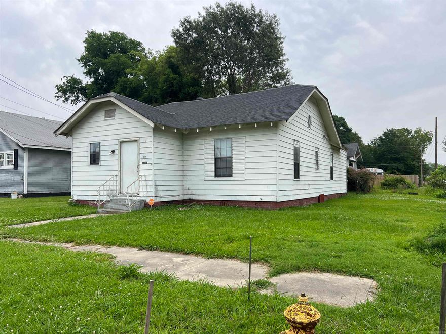 Great investment opportunity on a large corner lot and has newer roof and newer plumbing.   See agent remarks
