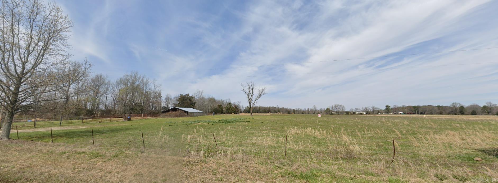 Beautiful Acreage for your dream home. Approx. 40, level acres of pasture with large pond and barn for your animals. Property fronts Lone Star Rd, with entrances off of Chalk and Lone Star.