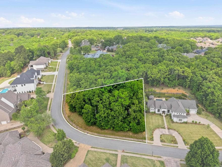 Lot 26 Chimney Rock Dr. Sherwood, AR 72120  Perfect opportunity to build your dream home in a highly desirable gated community! Property in this neighborhood rarely become available, making this a unique chance to secure your spot in one of Sherwood’s most sought-after areas.  This .74-acre lot offers a beautiful setting with mature trees, providing both privacy and flexibility for a custom build. Surrounded by well kept homes, this property combines peaceful living with convenience to nearby amenities.  Don’t miss your chance to own one of the few available lots in this exclusive community.  Highlights:  .74-acre lot Gated community Rare availability Ideal for custom home build Established, desirable neighborhood