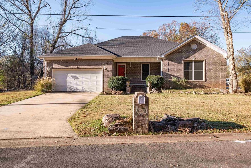 Discover a well-maintained home with a desirable split floor plan and peaceful green space behind the property. Offering 3 bedrooms plus an office (or use as a 4th bedroom), this layout provides flexibility for any lifestyle. The primary suite features a tray ceiling, dual vanities, and a relaxing jetted tub. Enjoy direct access to the screened sunroom, which also opens to the great room—an ideal spot for relaxation. The great room boasts a vaulted ceiling, creating an open and airy feel. This property is currently used as a short-term rental, which is why the great room is staged with a pool table and game tables rather than traditional living room furniture. Guests love the entertainment space, and it can easily be converted back to a traditional setup. The spacious kitchen offers abundant counter space, island, a tray ceiling over the dining area, and plenty of room to cook and entertain. Additional highlights include wood and tile flooring throughout, a new roof (2024), a backyard shop for added storage, and a side parking pad perfect for extra guests. Move-in ready, versatile, and full of charm—this home is a must-see.