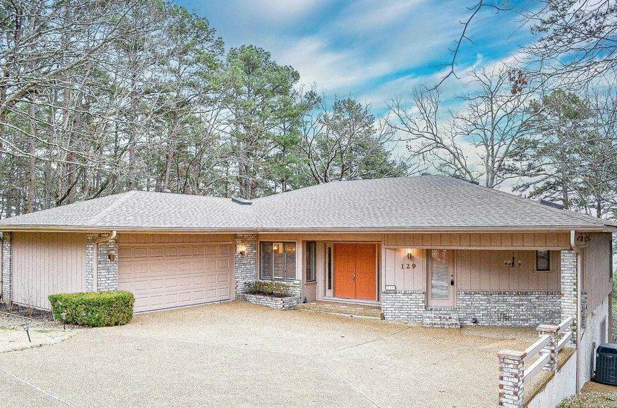 Enjoy the the vista views from your peaceful living areas and bedrooms! This two bedroom, two bath home has spacious Great room with Arkansas room. Eat in dining area. Kitchen with updated granite countertops and cabinets. Jenn air wall oven. Surface range. Kitchen refrigerator and microwave to convey. Beautiful tiled fireplace for gas logs only in Great room. Two bedrooms apart with full bathrooms. Primary bedroom with ensuite and walk in closet. Bathroom with granite countertop and walk in shower.  Two car garage. Adjacent lot is being sold with home. Call for your appointment today. Hot Springs Village POA has a one time buy in fee of $2000.00 payable at closing. Agents see Remarks. No Sellers Property Disclosure. See agent remarks for showing instructions. Roof inspected November 2024, 30 year architectural shingle roof approximately 10 years old. HVAC new motor and thermostat replaced 2024 Water Heater replaced in 2015