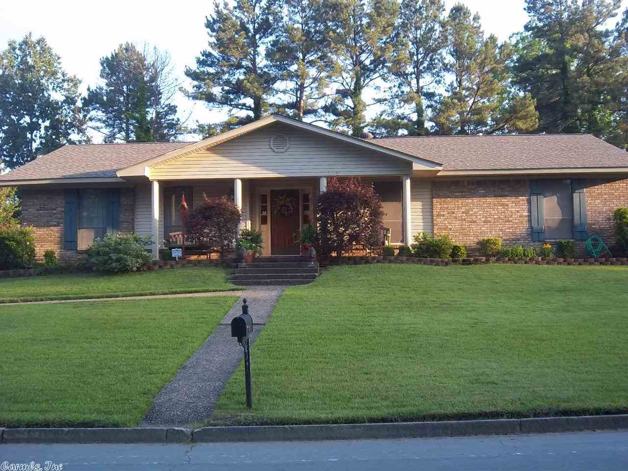 BEAUTIFUL Curb appeal, immaculately clean & move-in ready, extra landscaping, convenient location near schools/shopping/hospital. new roof, new siding, new exterior A/C unit, large family room with wood burning fireplace, formal living & dining, eat-in , over-sized double enclosed garage. TAXES REFLECT H/S CREDIT. Call office for showing instructions...ACTIVE ALARM!!! (Antique light fixture above kitchen sink does not remain & will be replaced).