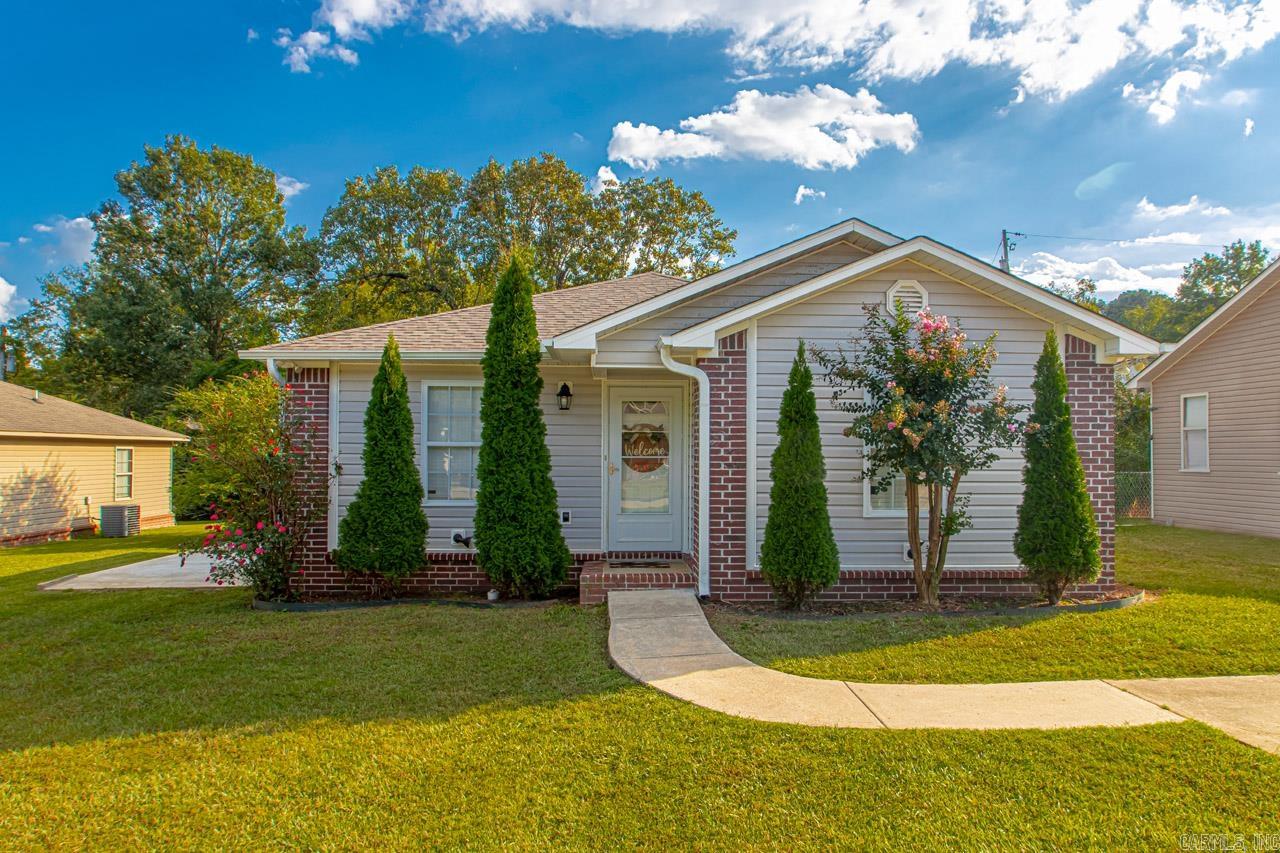Don't miss a 3 bed 2 bath under 170K in Sheridan School District and steps away from all the schools!!!! This home has a new roof and HVAC system. Fresh paint and is move in ready. There is a covered back porch for your fenced in backyard and an extra parking pad located on the side of the house. Completely move in ready!!! Call us!!!!!