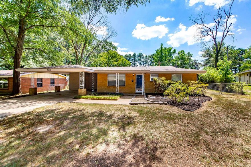 Welcome to this charming 3 bedroom, 1.5 bath home offering fresh updates and plenty of space! Inside you’ll find newly painted interiors that create a light and inviting atmosphere, complemented by durable flooring throughout. The kitchen features a natural gas stove, stainless steel appliances, white cabinetry, and a stylish subway tile backsplash, opening to a dining area perfect for family meals. The living spaces are generous, including a bright sunroom that adds extra flexibility for a home office, playroom, or cozy retreat. The oversized primary bedroom offers its own half bath for convenience, while the additional bedrooms share a refreshed full bath with modern finishes. Step outside to a large backyard featuring mature trees, a fenced-in area, and an impressive workshop—ideal for hobbies, storage, or a home business. With a covered carport, new HVAC installed in 2024, and thoughtful updates throughout, this home combines comfort, functionality, and value. Move-in ready and waiting for its next owner!