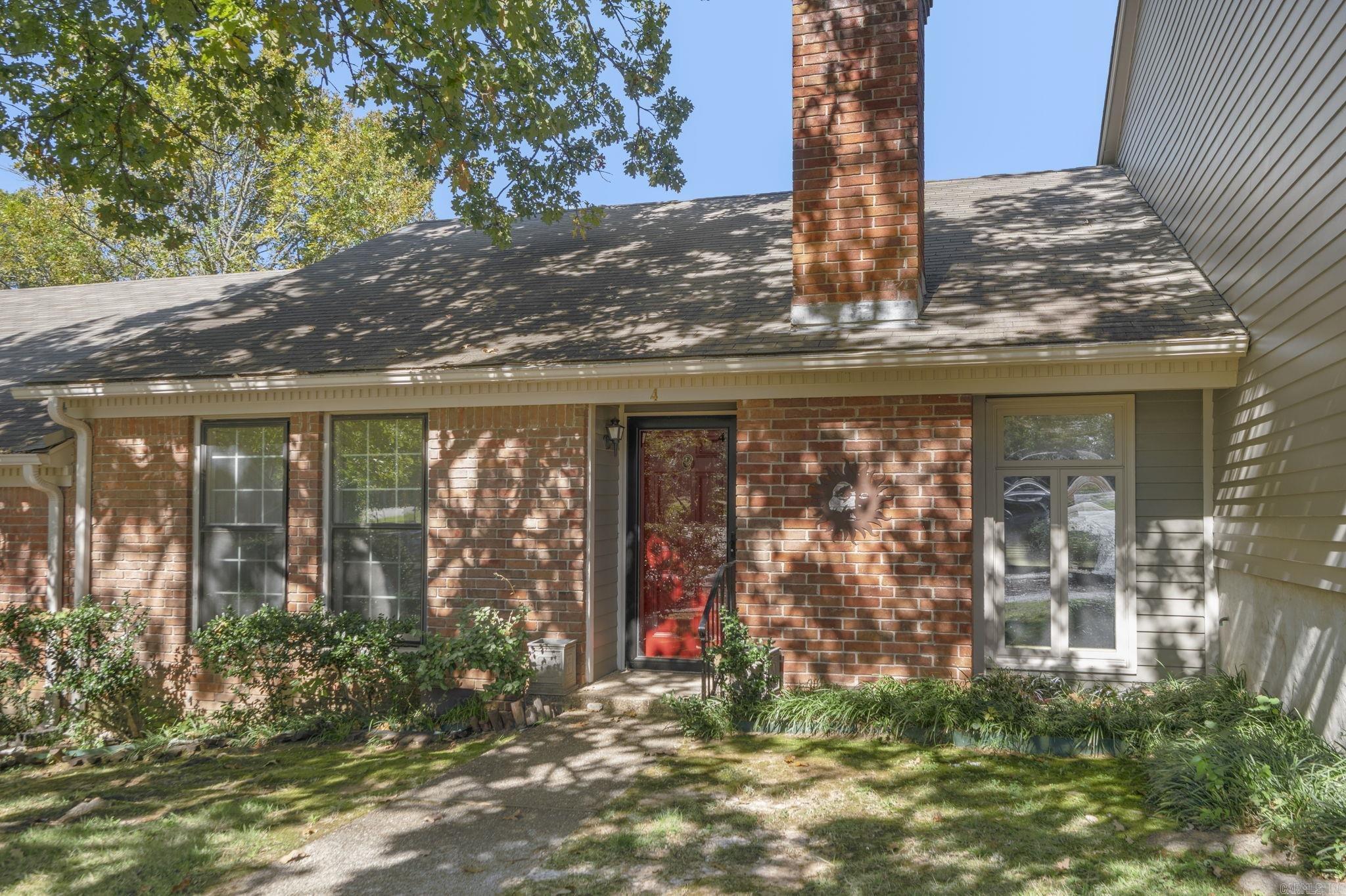Freshly updated Stoneleigh Court condo in Midtown! These are RARELY available. One level 2 bedrooms and 2 full baths. NEW paint throughout. Open and bright living/dining space with a fireplace. Kitchen is equipped with range, microwave, dishwasher & fridge. NEW flooring in bedrooms. Both bedrooms have 2 closets each. NEW walk-in shower in the hall bath. You'll love the private courtyard out back! Easy private parking. Low POA fee pays for exterior maintenance, insurance, trash service, termite contract, and lawn maintenance for the common areas. Floorplan in the photos. Great home or ready to lease investment! No seller disclosure.