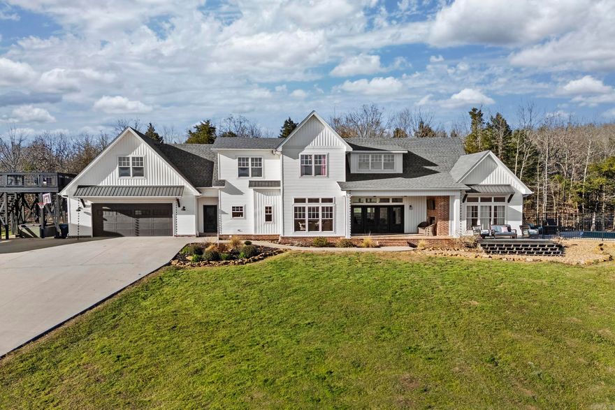 On the ridge of Turkey Mountain sits this stunning 4 bed 3.5 bath home on just over 8 acres. From outdoor built-in light shows to whole-home instant hot water, don't miss this one! European white oak flooring, butler's pantry, quartz countertops in the whole place, indoor walk-in safe room, 10ft ceilings, duel fuel heat, gas fireplaces indoor and outdoor, commercial refrigerator washer and dryer conveys, inground salt pool with cantilever coping, tanning ledge, slide, and diving board, herringbone brick floor patterns in spots, huge 30*30 shop with separate apartment, stadium lights for the yard, whole home Bose speaker system, huge observation deck, hot tub, rain chains, 50 amp RV hookup, Tesla charger in heated/cooled garage equipped with additional commercial grade fridge/freezer, separate carport with electricity that dwarfs the home, free standing tub with air jets in the Primary bath, there's just so much to see. Make this one yours today! Check showing/agent remarks for additional info for your clients.