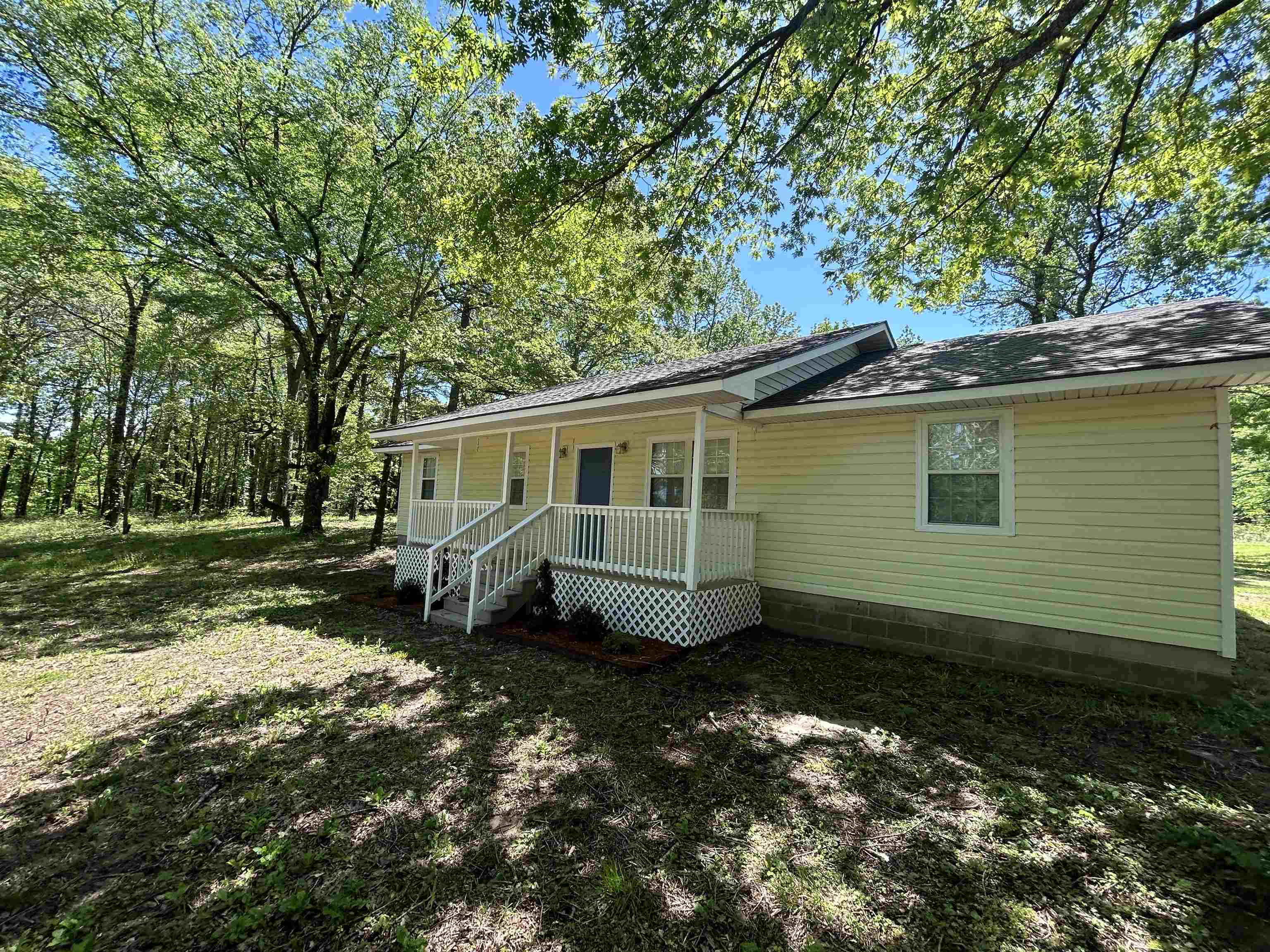 Charming Remodeled Home on 5 Acres in a Peaceful Setting - USDA eligible This freshly remodeled 3-bedroom, 2-bath home sits on a lovely 5-acre lot in a quiet neighborhood. Inside, you'll find updated finishes throughout and an open layout ready for you to move in. The property includes a security camera system and plenty of space for outdoor living or future projects. As a bonus, we're offering a $1,000 credit toward appliance furnishing with an acceptable offer!