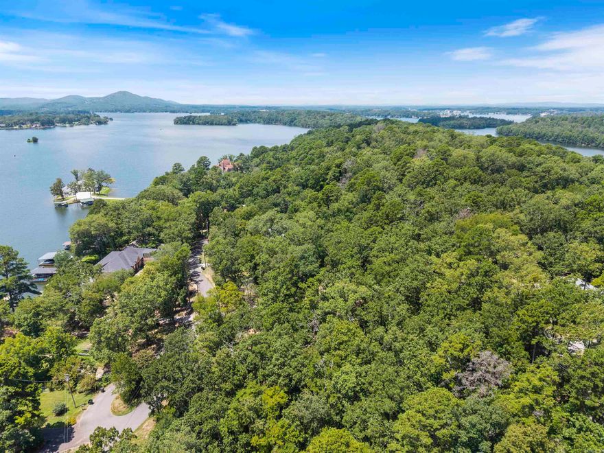 Prime investment opportunity in Hot Springs! These 9 buildable lots offer sweeping elevation and the potential for breathtaking views of Lake Hamilton when developed correctly on the sloped terrain. Located just minutes from lake access, Garvan Woodland Gardens, and downtown Hot Springs, this rare collection of lots opens the door for a lucrative short-term rental community or a custom residential retreat. Whether you're a developer seeking your next Airbnb project or a visionary buyer wanting to build vacation homes with high appeal, this property is packed with potential. Utilities are nearby, and the area supports short-term rental use, making this a golden opportunity in a rapidly growing market. Take advantage of the natural beauty, serene surroundings, and investment upside — these lots can be purchased individually or bundled for development scale. Secure your foothold in one of Arkansas's most popular vacation destinations!