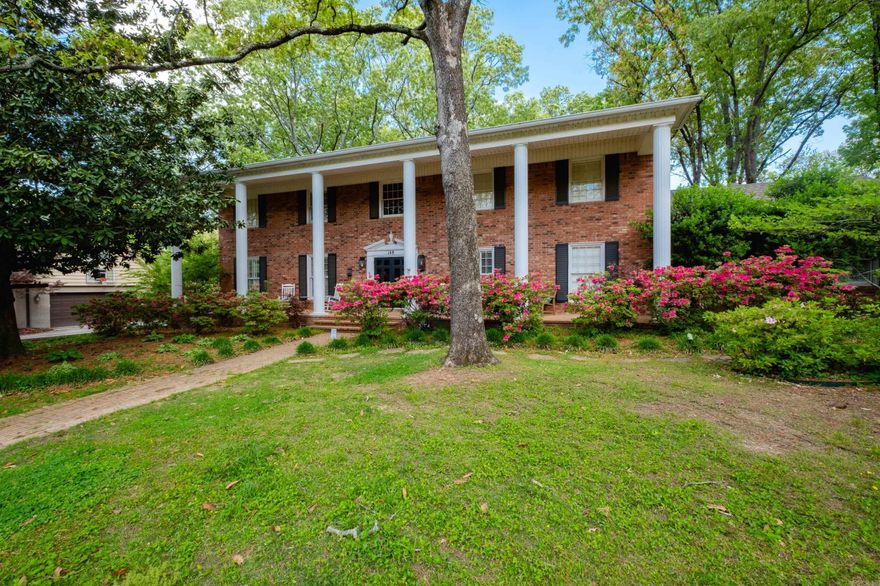 Classic stately Pleasant Valley home! Double doors lead the way into a lovely 2 story foyer. Hardwood floors are found throughout the main level w/ the exception of the hearth room. 9 foot ceiling are also on the main. The formal living & dining have exceptional natural light. The office could also be used as a guest bedroom. The gourmet kitchen is exquisite w/ custom cabinets, Thermadore appliances w/ built in refrigerator & large island. The hearth room is conveniently located off the kitchen/breakfast, has built in cabinets & wood burning fireplace. A full & half bath along w/ a laundry room are on the main. Second floor has 4 bedrooms. The primary bedroom has a fireplace along w/ an updated bath & two closets. 3 other bedrooms are all large w/ 2 having hardwood floors. The second bath is very unique with double sinks, a toilet and shower on one side and toilet and shower/tub on the other. Another laundry area is located on the second floor. The backyard is very large, flat, private and has a shaded patio and Koi pond. Side loading garage with lots of storage. New roof 2025.