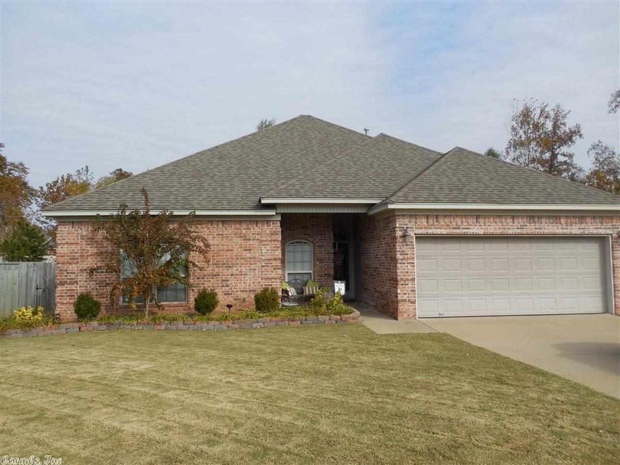 Very pretty 4 bedroom 2 bath with split floor plan, breakfast bar and open living concept. Back lawn is private with a storage shed and wood fence and covered patio. Located in Heritage Farm Subd, close to I-30, shopping, schools and has a community pool, playground and picnic area.