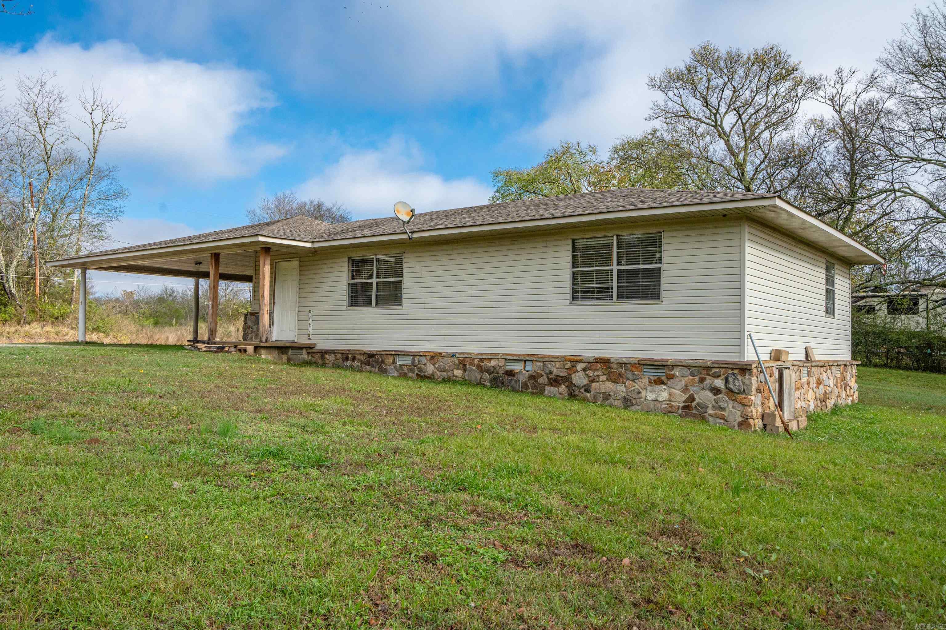 Stop paying rent and start building equity. This affordable gem offers country-like living within city limits with close proximity to all things Hot Springs. 2 spacious bedrooms with 1 updated bath. Whether you plan to owner occupy or add it to your rental portfolio, you cannot go wrong with this one. Central Heat/Air and covered parking. Newer roof. Bring all offers.
