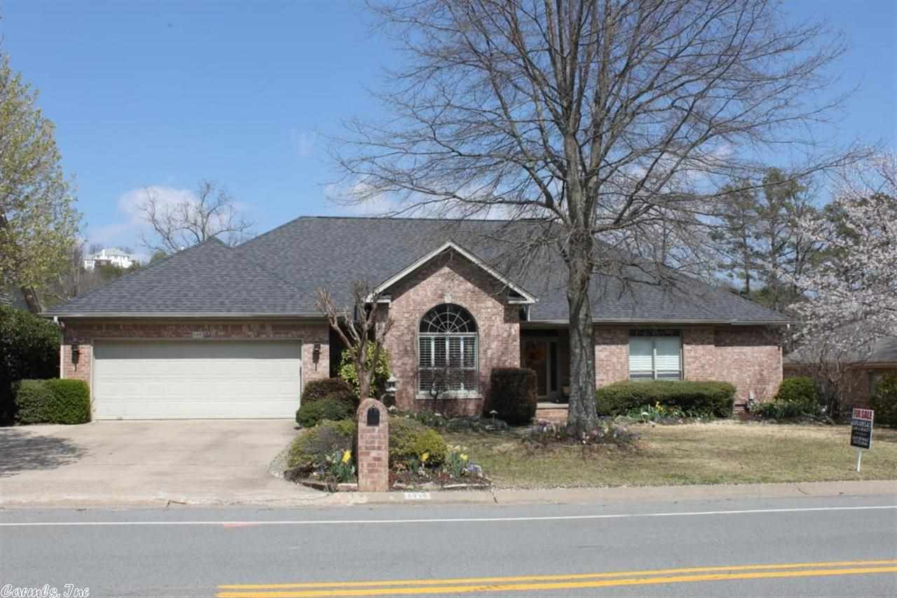 Charming w/ quality combined in this custom built 1 level home!-hdwood floors,9' ceiliings, plantation shutters THROUGHOUT! Great floorplan w/ split bdrm plan-3 bdrms & full bath on 1 side & lrg private master suite with newly remodeled bthrm. Open den w/ built-ins & FP and dining-Chef's kitchen w/ a lg island, pull out drawers,double ovens, warming tray & eat-in area. A h/c bonus room off the covered deck (Perfect for entertaining or an office) -300 square feet of covered deck! Surround sound system stays!