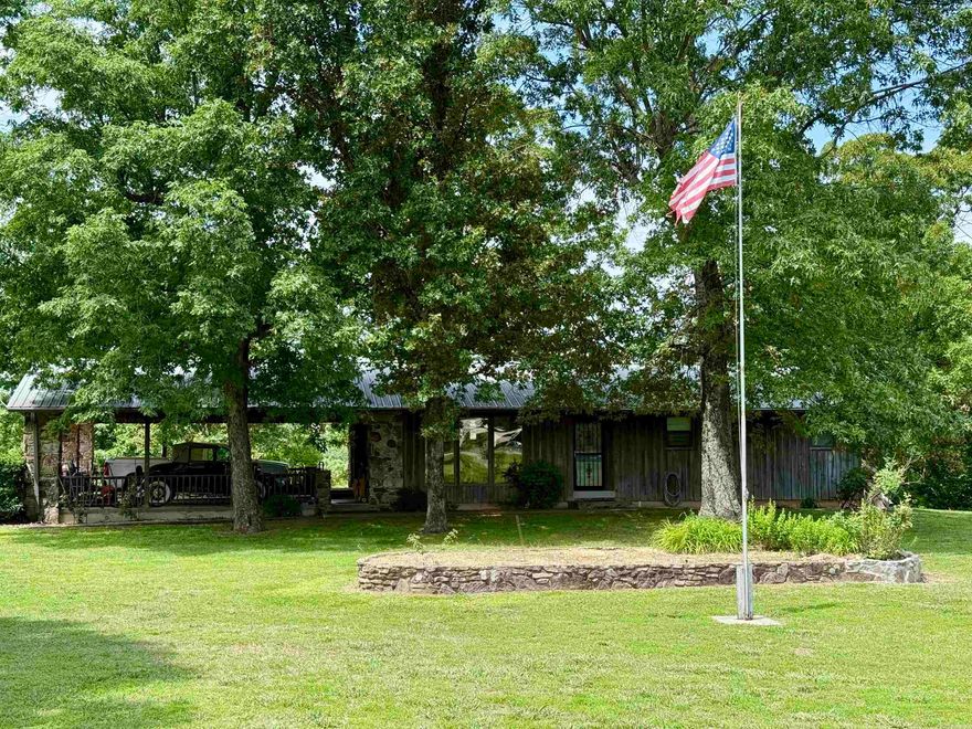 Discover your own rural retreat at 4403 Highway 63, Mammoth Spring, AR. Sitting on approximately 23 acres with 1,292 sq ft of ranch-style living, this 3 bed/1.5 bath home includes central HVAC, attached 2-car carport, and large basement. Outside, enjoy a private pond, mature trees, and multiple outbuildings— including a large in 60’×30’ shop, workshop, barn, old home place and storage areas—perfect for livestock, equipment, or home-based business. With approx. 1,300 ft of highway frontage just minutes from Spring River, this versatile property offers peace, privacy, and investment potential. Sold in “as-is” condition. Auction scheduled for Sunday, July 13th @ 3pm (online) at SOLDasap.com. Don’t miss this rare rural opportunity! SOLD IN 2 TRACTS, Buy 1 tract or buy them all! The choice is yours!