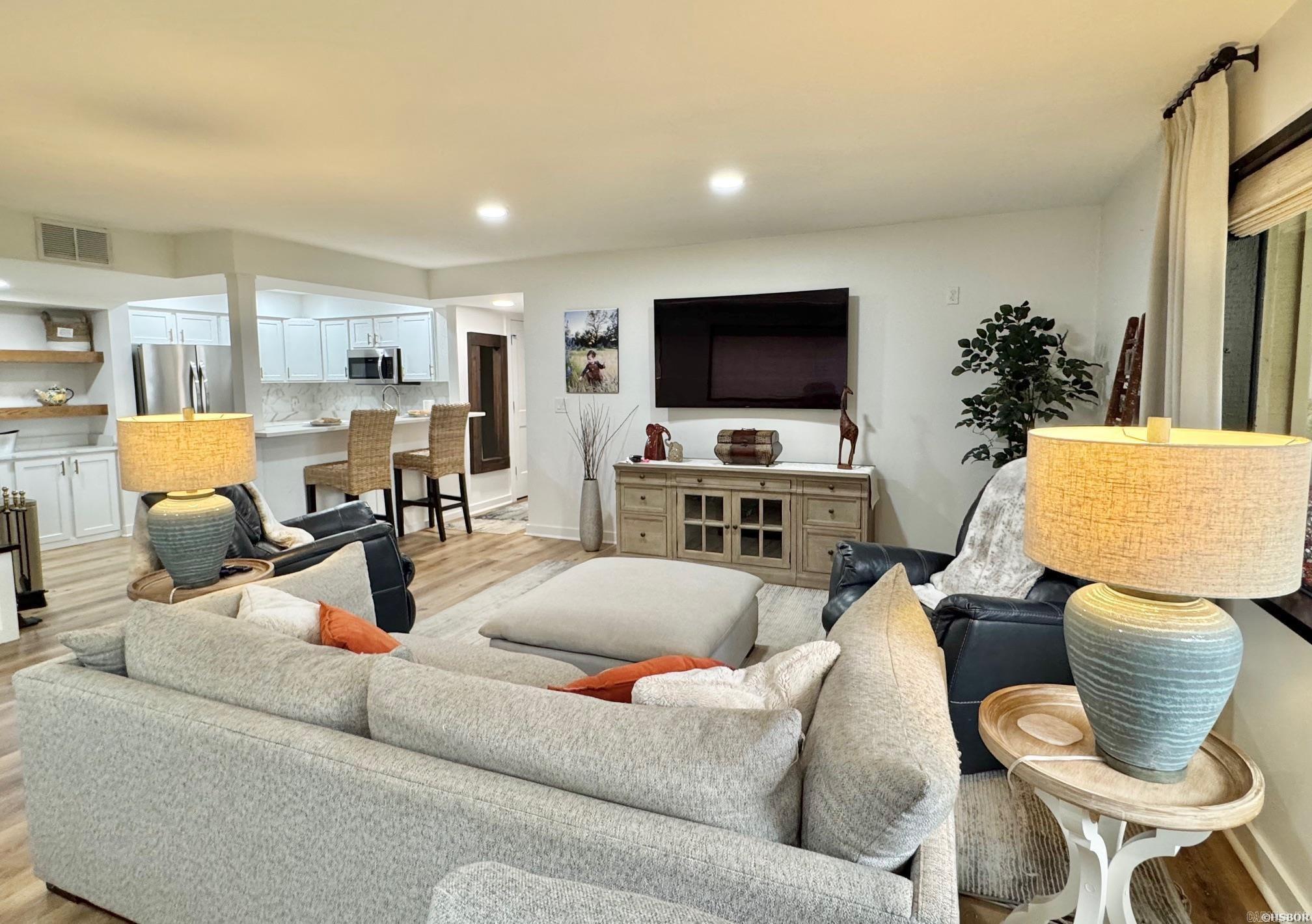 Enjoy lakeside living in this beautifully renovated, entry-level condo on Lake Hamilton with no steps. Inside, youāll find new flooring, fresh paint, updated fixtures, and a modern kitchen with brand-new appliances and stylish countertops. Two cozy woodburning fireplaces add warmth and charm, while the open-concept living area flows to a nice private deck overlooking the lake with direct access to the water. The expansive boardwalk and pool area add to the resort-like experience. Selling fully furnished. Located in Lake Hamilton School District and just minutes from shopping, dining, and everything Hot Springs has to offer.