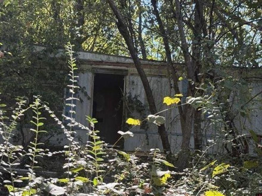 Fixer Upper opportunity in Mountain Home, AR! The 0.4 acre m/l lot just minutes away from downtown Mountain Home is nice and level. The existing mobile home needs some tender loving care or use the site to build a brand new home.