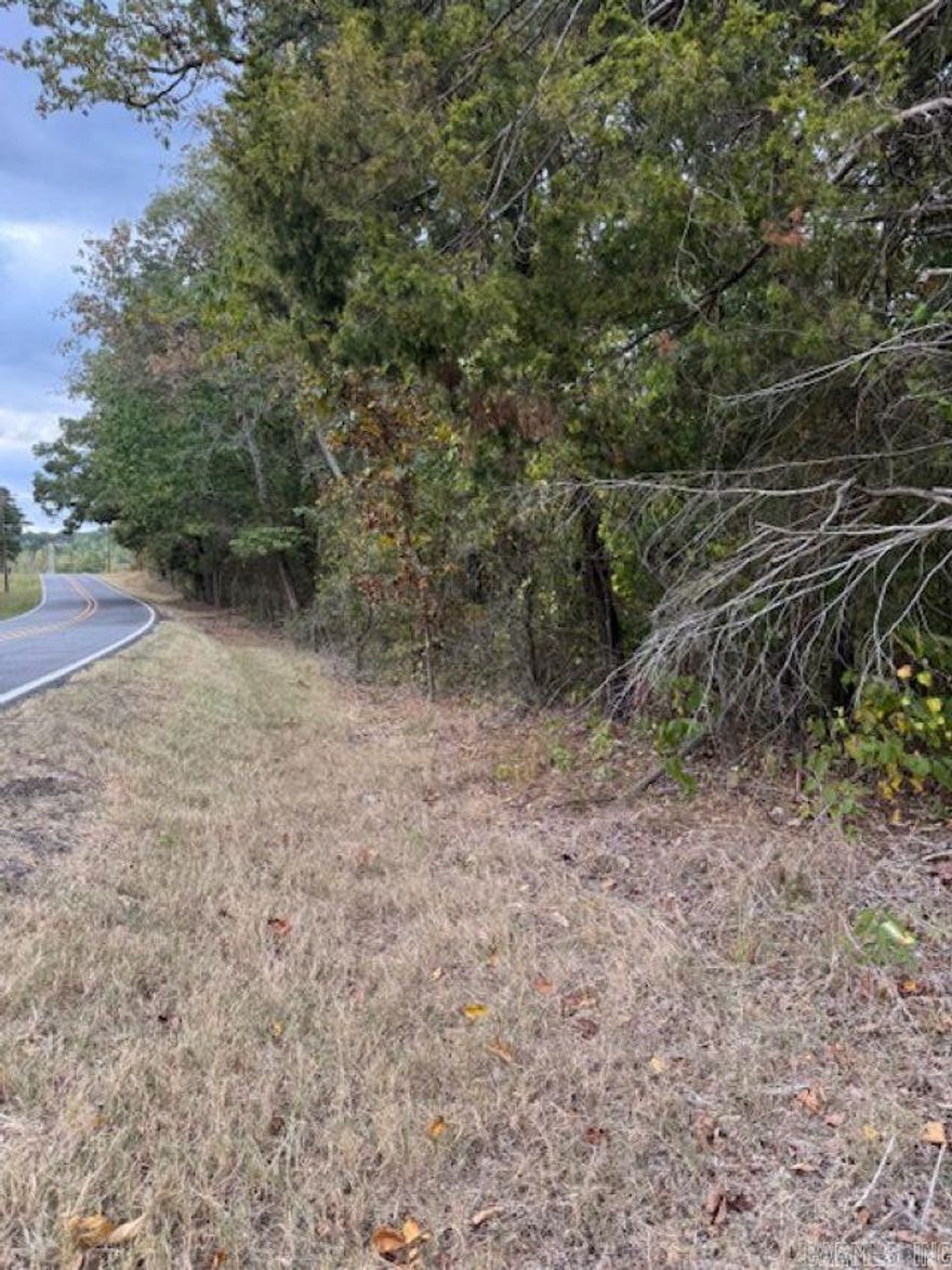 Discover 23.71 acres of natural beauty tucked away along Arkansas Highway 16 in Cleburne County, just west of West Pangburn.  Located less than 15 miles from the sparkling waters of Greers Ferry Lake, this property offers both convenience and seclusion.  The land is heavily wooded, providing privacy, recreation, and an ideal habitat for wildlife. The terrain slopes toward the rear, leading to a stunning bluff that overlooks the picturesque Red River Valley. The bluff offers a spectacular backdrop for a future home site, where you can take in breathtaking views year-round.  Whether you are seeking a private retreat, hunting land, or the perfect spot to build your dream home or cabin, this property delivers. With easy access to Greers Ferry Lake, Heber Springs, and the surrounding Ozark foothills, the location combines outdoor adventure with the peaceful charm of the Arkansas countryside.  PLEASE SEE AGENT AND SHOWING REMARKS!
