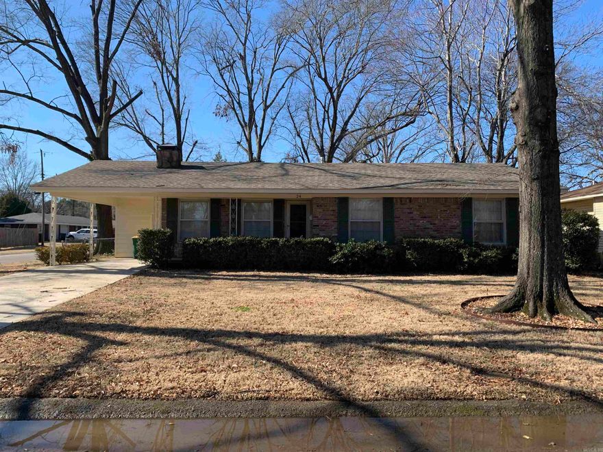 Nice brick cottage with new paint, new carpet and refinished hardwood floors.  Small kitchen with electric cook top, electric oven, dishwasher and refrigerator.  Laundry room with washer and dryer.  New carpet in the bedrooms.  New toilet and vanity in each bath.  Fenced back yard!   Architectural Roof just a few years young!! New Driveway and carport slab!  New sod!!