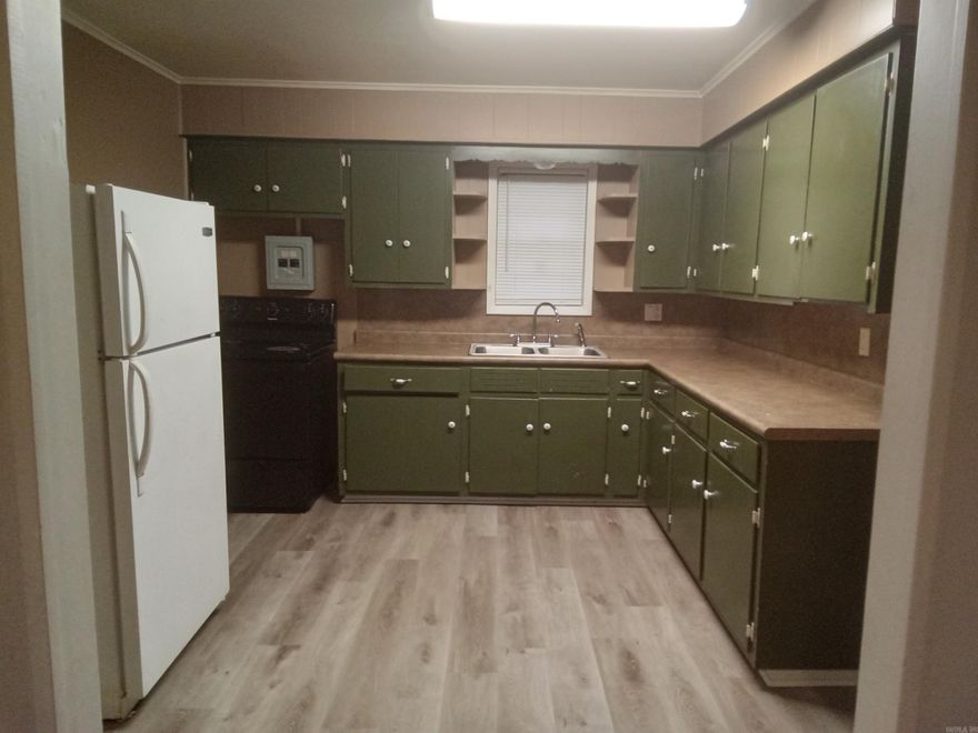 Spacious 3 bedroom, 2 bath home with a large yard. There is a storage building on the property as well as a covered carport for anything that needs stored outside.  Home is located outside of the city but a quick commute to Watson Chapel School, restaurants, stores and access to I-530