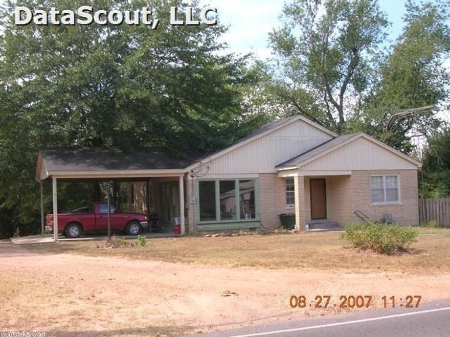 Looking for a charmer/ fixer-upper /with little to repair?  This home has hardwood floors, two full baths that don't require costly updates. The kitchen is equipped with a brand new dishwasher.  A little paint, refinish the floors, and polish or replace the kitchen sink and you will see a big difference.  Approximately 1576 sq.ft of central h/a living space and an added 200 sq.ft. designed as a sunroom, is cooled with a window unit. MAKE AN OFFER.  MOTIVATED SELLER