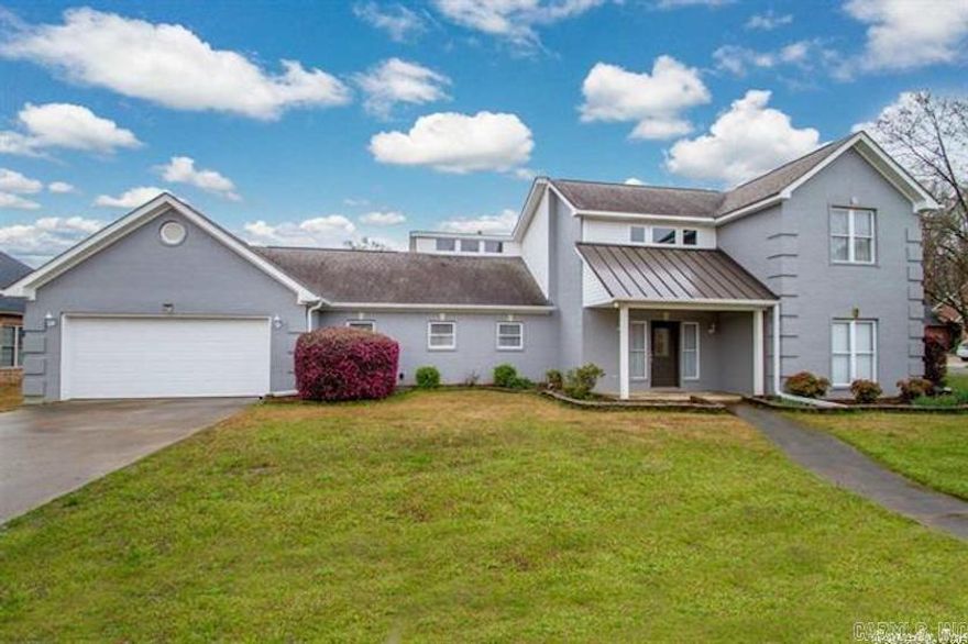 Spacious and updated home in a highly desired neighborhood. 2 bedrooms and 2 baths down, 2 bedrooms with a jack and jill bathroom up. Fenced backyard. Move in ready!!