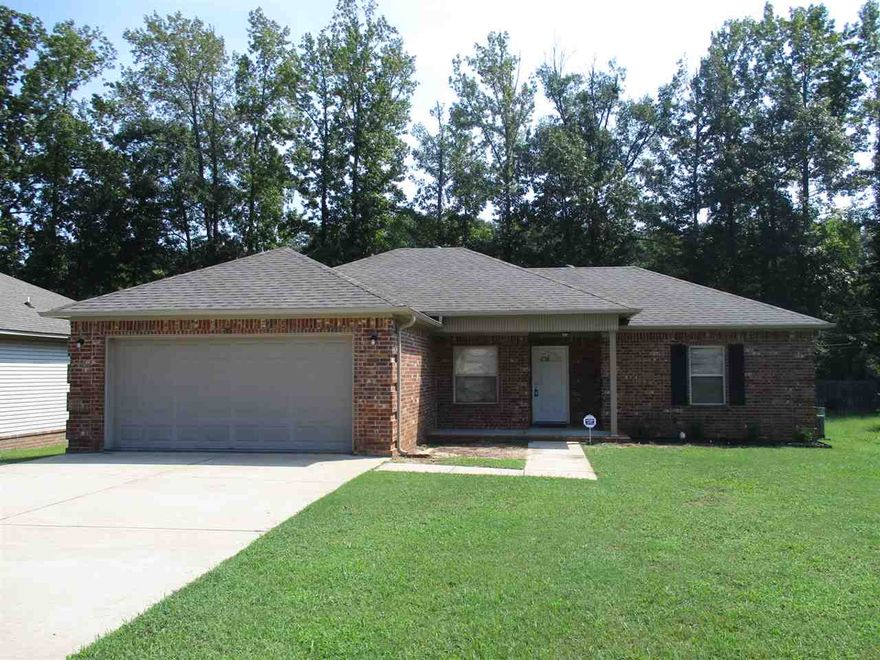 The home has new paint on the interior-exterior and updated landscaping providing a welcoming curb-appeal. Your new home features gorgeous wood vinyl flooring throughout the main areas and plush new carpet in the bedrooms. We have updated the AC system and water heater to insure you are comfortable in the heat of the summer and provide efficiency. Your new kitchen has refinished white cabinets with new modern countertops providing plenty of space for dining at home.