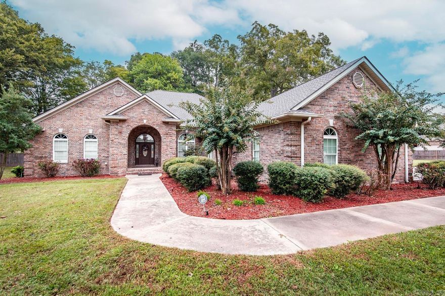 Beautiful Lakefront Home only 20 miles from downtown Little Rock.  This welcoming single-story home sits on over 1.5 acres and boasts 3 large bedrooms with ensuite bathrooms, a 4th bonus room/bedroom, primary bedroom containing sitting area with fireplace, all hardwood and tile flooring, vaulted ceilings, sunroom, large laundry room, safe room, covered stone patio, 20x40 Shop with two roll up doors, RV Hookup with water and sewer, covered 2-slip boat dock, gutters with leafguards and 4 car attached garage. New Roof 2022, Fence and Partial Decking for dock 2021, Hot Water Heater(1) 2021. The Boat Ramp is located next to home and fuse box is wired for generator. Don't miss out! Schedule your private showing today! see agent remarks
