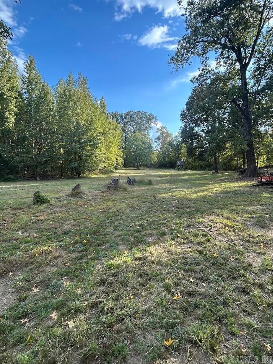 12.99 Acres Partially Cleared, Fenced, and Full of Potential! Discover your own private retreat on 12.99 beautiful acres located just outside the city limits the perfect blend of privacy, nature, and convenience. This unique property offers a mix of open cleared areas and mature woods, fully fenced and ready for your vision. Enjoy peaceful mornings by the small pond, and spend your evenings watching abundant wildlife roam freely including excellent deer hunting opportunities. Despite the tranquil rural setting, you’re only minutes from town and close to the scenic Red River, making it an ideal spot for recreation or building your dream home. Whether you’re seeking a quiet country escape, hunting land, or the perfect site for a future homestead, this property has it all.