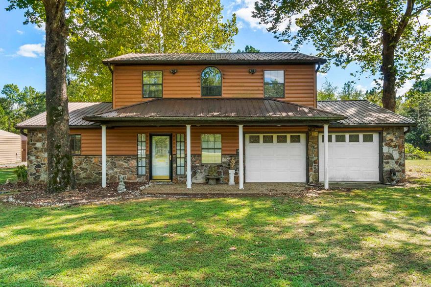 Well-maintained 4-bedroom, 2.5-bath home with a shop, ideally located just minutes from the Air Force Base and Sherwood. Situated on a spacious 1.39-acre lot (including the adjacent parcel), this property offers a unique log cabin-style exterior with plenty of room to spread out.  The detached shop provides excellent space for storage, hobbies, or a workshop setup, perfect for anyone needing extra functionality beyond the home.  Recent updates include a remodeled kitchen with new cabinets, new carpet in the living room, a recently replaced HVAC system, and updated appliances, giving buyers peace of mind on major components. The home also features a large primary suite, storm shelter, and a generously sized fenced yard ideal for pets, entertaining, or outdoor enjoyment.  With a few additional cosmetic touches, this property offers incredible potential to truly make it your own. Enjoy the blend of privacy, space, and convenience in this one-of-a-kind property!