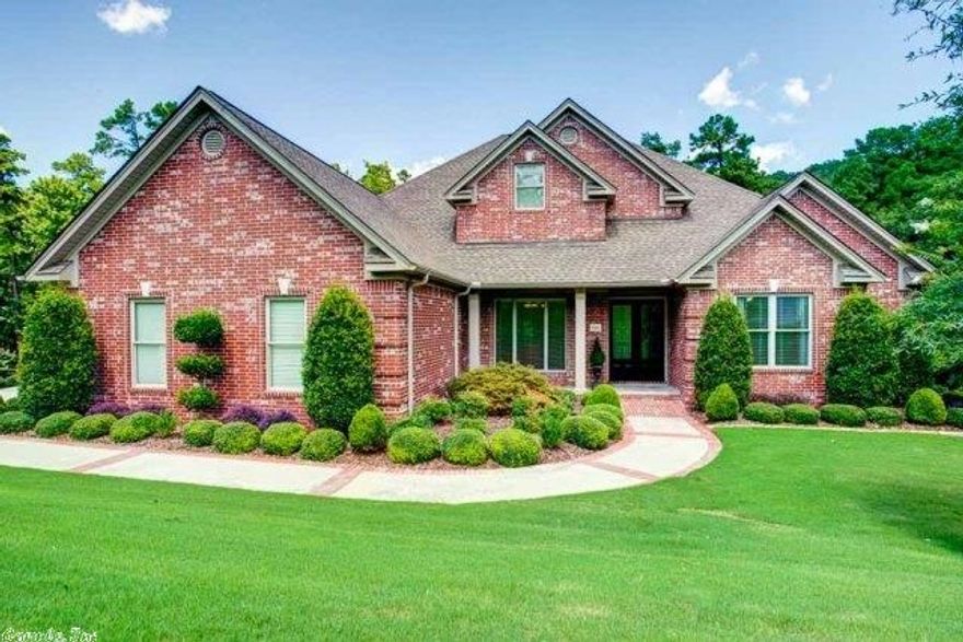 Custom Home in the premiere V.O.W. location. This home was meticulously built to the highest standards allowing it to be classified as a Energy Star Qualified Home.The expansive main level boast the foyer, great room, dining room, kitchen w/dining & hearth area, master suite, guest suite and two additional bedrooms and bath. The lower level features a second great room or 5th bedroom suite & fabulous sunroom. Additional features include 2 covered porches and landscaped grounds. Backs up to woods for privacy