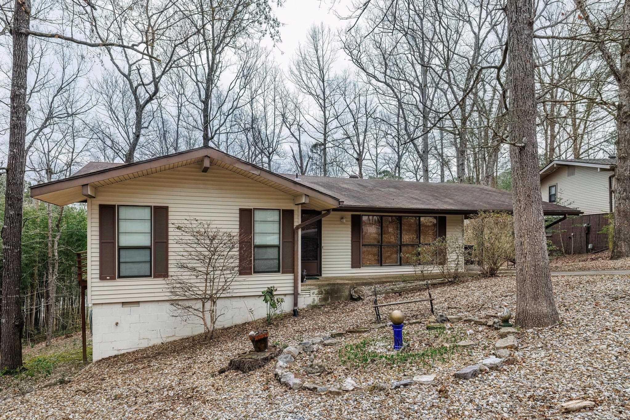 Two bedroom home near the Coronado Fitness Ctr, Tennis Center, Lake Cortez and close to West End amenities. Deck overlooks wooded setting. Hot Springs Village has a one time buy in fee of $2,000 paid to the POA at closing.