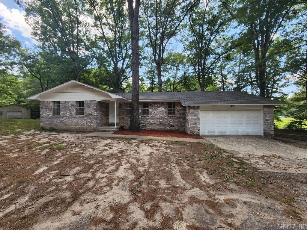 Welcome home to 4004 Vinson Rd in Little Rock. Great home sitting on 6+ acres, with recent updates including roof, HVAC, kitchen cabinets, bathrooms, paint, deck, etc. 20 x 30 shop with power, water, sink and wood heater. Large utility room with washer/dryer conveying. Separate dining room could be 3rd bedroom. Includes living room, large eat in kitchen area, plus breakfast bar. Large 2 car garage with large storage room. Storm Shelter out front of house across drive. Property completely fenced in with horse stall/pole barn. 6+ quiet country acres just minutes from all Little Rock area amenities. See showing remarks.