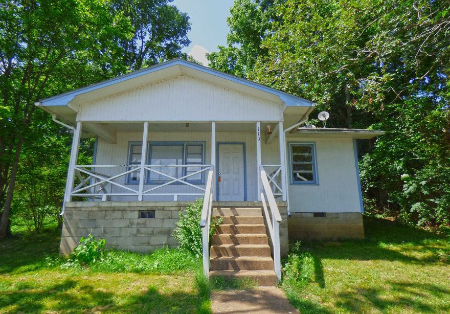 Two Bedroom Fixer Upper! This house needs a little TLC but has 2 bedrooms, one full bath, living room kitchen, wood floors, and nice front porch.  Sits close to Main Street in Hardy. Could be a great weekend rental or has been a long-term rental for years.