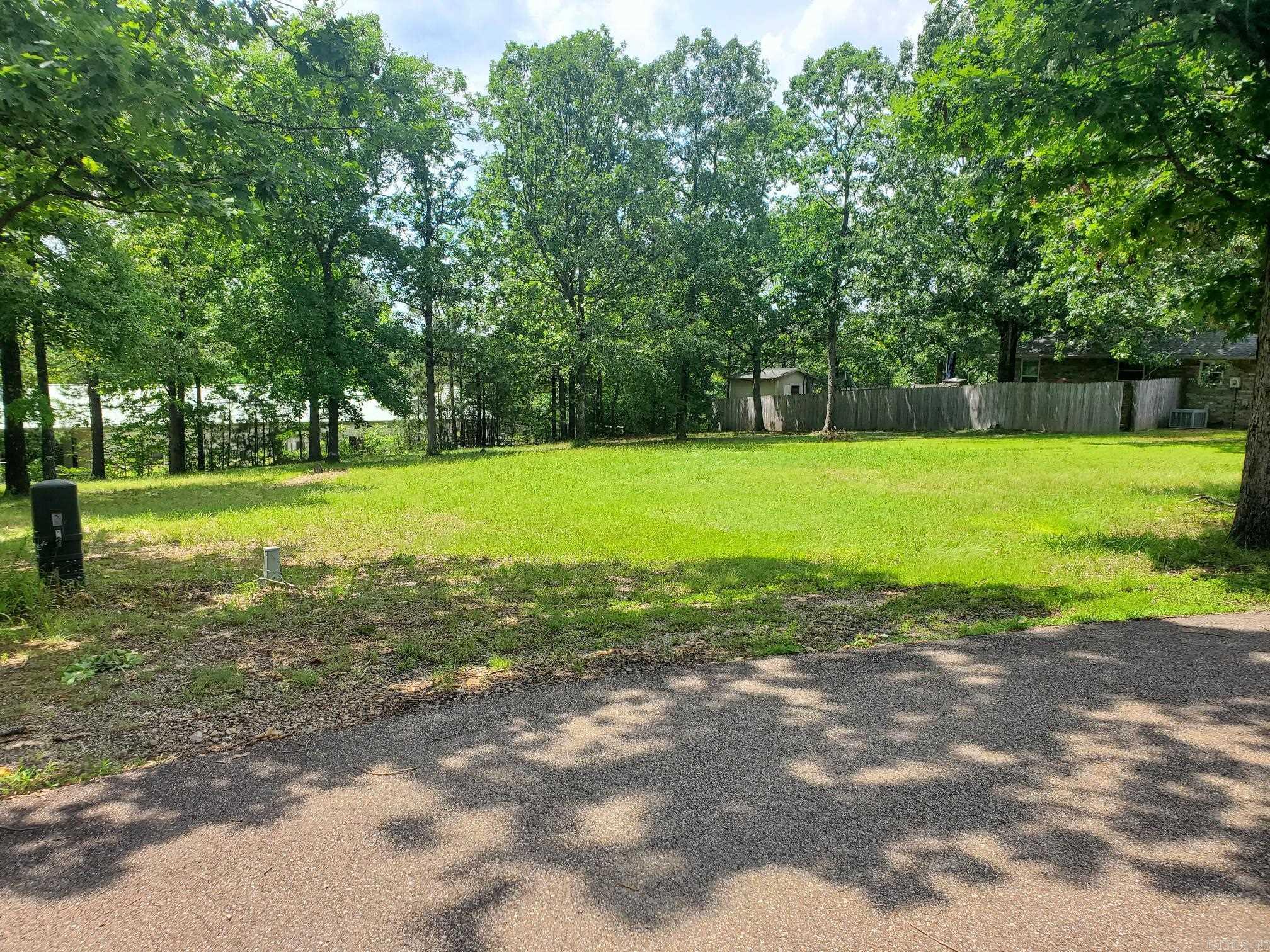 Beautiful wooded lot with city utilities available. Dead end street. Ready to build on. Some restrictions.