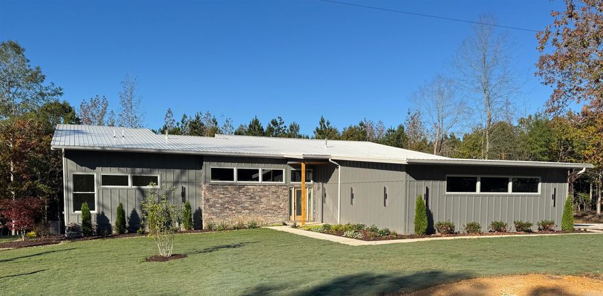 Welcome to this exceptionally designed new construction home,  less than 20 minutes from downtown Little Rock.  This stunningly beautiful home features a one-level open concept kitchen, breakfast bar and living area.  Along with a primary suite, there are 2 additional bedrooms,  and 2 1/2 bathrooms.  Designed for those who appreciate both quality and beauty the kitchen showcases high-end GE Café Series appliances including a refrigerator, freestanding gas stove, and dishwasher—all selected with no expense spared.  The home’s exterior is beautifully finished with top-end Anderson Doors and Windows, complete with Low-E glass for durability, comfort, and enhanced energy efficiency.  The astonishing gorgeous patio, great for entertaining, makes the neighbors envy you while backing up to a perfectly positioned green space.  Last but not least, your family can feel at ease with a storm/safe room and a Generac whole house generator.