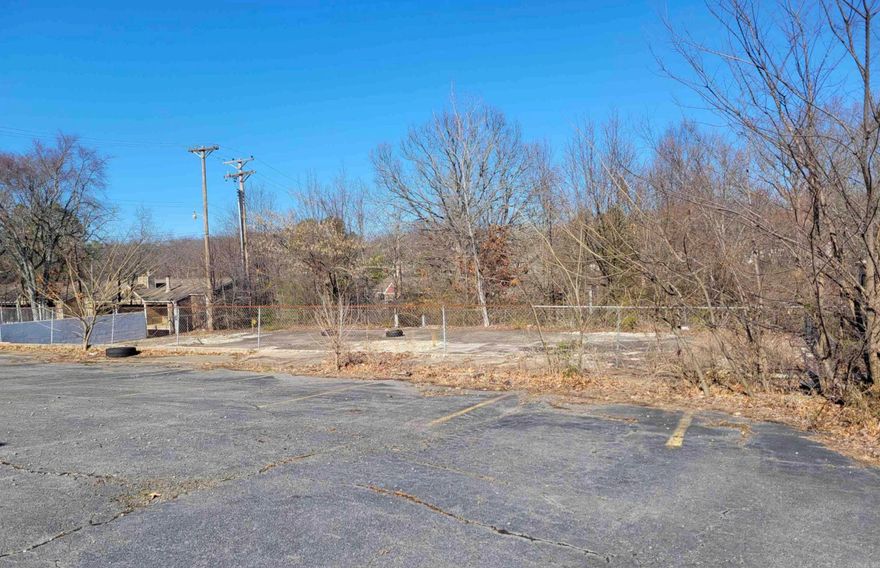 Prime commercial property available near the high-traffic intersection of North Hills and Hwy 107/JFK Boulevard in North Little Rock. The site features a paved parking lot with around 20 spaces, making it ideal for a small professional service business or duplex/apartment buildings. Surrounded by restaurants, retail, and multifamily housing, this location could not be more convenient.