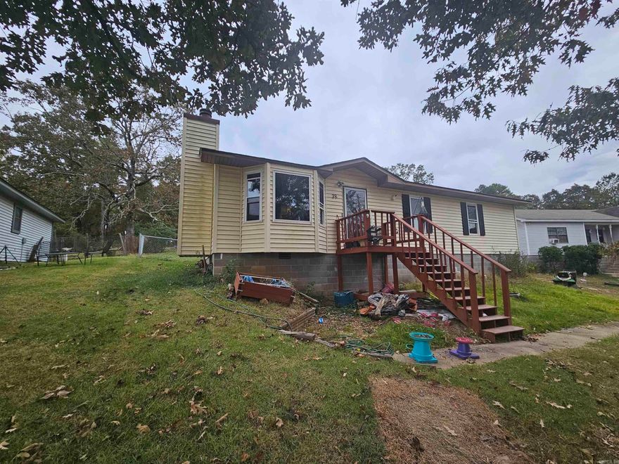 Great home for a growing family in a established neighborhood and is walking distance to Cato Elementary and Sylvan Hills Middle Schools! This home has several new upgrades; Brand new roof, brand new windows, brand new sliding back door, newly installed french drain in the backyard and the side of home. Appliances in the kitchen will convey. This home is low maintenance and budget friendly.