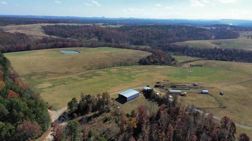 BIG SPRING RANCH:   This 325 acre cattle ranch boasts a wealth of natural beauty, including multiple free-running springs, picturesque ponds, and the beautiful Moccasin Creek meandering through its grounds.   Other features to this 100 cow calf unit ranch include a sturdy red iron barn???????, a large pipe corral with head chutes, strategically placed cattle feeders throughout the property, thoughtfully designed for rotational grazing, a small cabin with electricity, and breathtaking views!  Beyond its agricultural advantages, this property presents a prime opportunity for hunting enthusiasts.  Immerse yourself in the thrill of hunting deer, turkey, and other game, all within the privacy and seclusion of your own land.  Situated within 10 miles of both the White River and Norfork Lake, outdoor enthusiasts will revel in the abundance of recreational activities available, such as fishing, boating, and water sports. Embrace the perfect blend of rural tranquility and easy access to modern amenities, with nearby Calico Rock offering shops, dining, and services.  Don't miss the opportunity to own this remarkable cattle ranch and hunting property. Now listed for only $895,000!