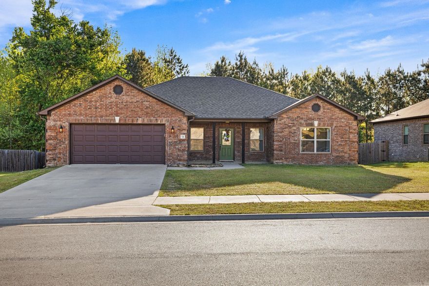 Beautifully maintained 4 bedroom home offering style, comfort, and functionality throughout. Open concept living, kitchen, and dining areas create the ideal space for everyday living and entertaining. Kitchen features granite countertops, stainless steel appliances, pantry, abundant cabinetry, under cabinet lighting, spacious island, and a breakfast bar perfect for gathering and additional seating. Split bedroom floor plan provides added privacy, with a spacious primary suite that accommodates a king sized bed. En-suite bath includes dual granite vanities, walk in shower, and oversized walk in closet with built-ins. Enjoy outdoor living on the covered back porch overlooking a level backyard and peaceful green space, ideal for relaxing or hosting guests. Conveniently located and move-in ready, this home combines comfort and modern finishes in a desirable setting. Schedule your private showing today!