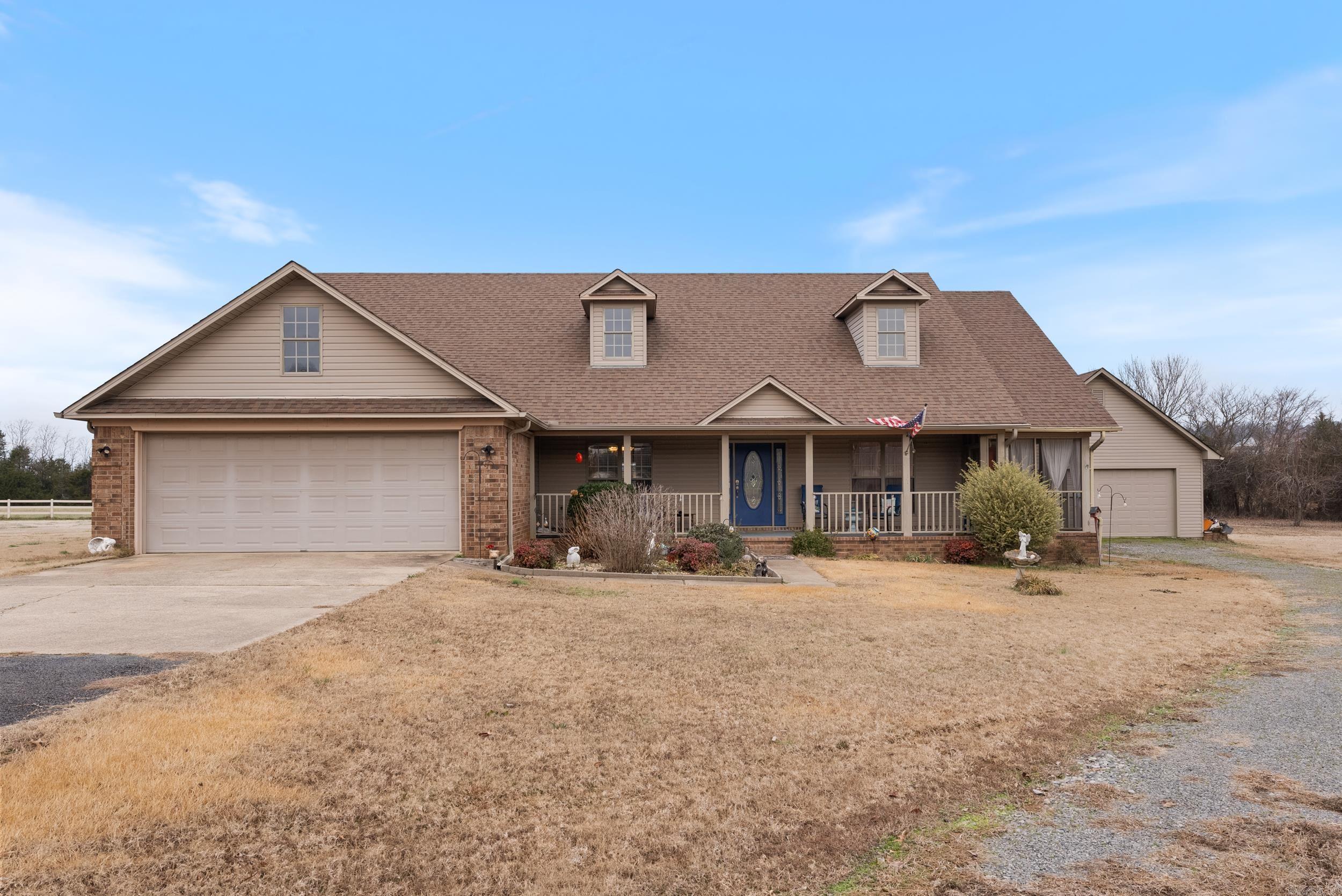 BACK ON MARKET DUE TO NO FAULT OF THE SELLER!! The Buyers financing fell through a week before closing! Welcome to this stunning 3 bed, 2 bath home, + office/flex room, located on a spacious 4.67 ACRE with cross-fencing ideal for horses. The open-concept living area is perfect for entertaining, featuring a large kitchen with updated countertops, double ovens, tons of counter space, and a pantry. A separate dining room adds to the space, making it easy to host family and friends. The oversized primary suite features access to a private screen in porch, and a luxurious master bathroom complete with dual vanities, jetted tub, walk-in shower, and a large closet. For added storage or tinkering, the property includes an additional 22 x 24 two-car garage/shop, as well as a 8 x 20 barn with overhangs on each side and loft storage. Enjoy the outdoors with a privacy-fenced area, ideal for pets, and plenty of room for horses, hobbies, or simply enjoying your own acreage. Whether you're looking for space to entertain, room to roam, or privacy, this property offers it all!