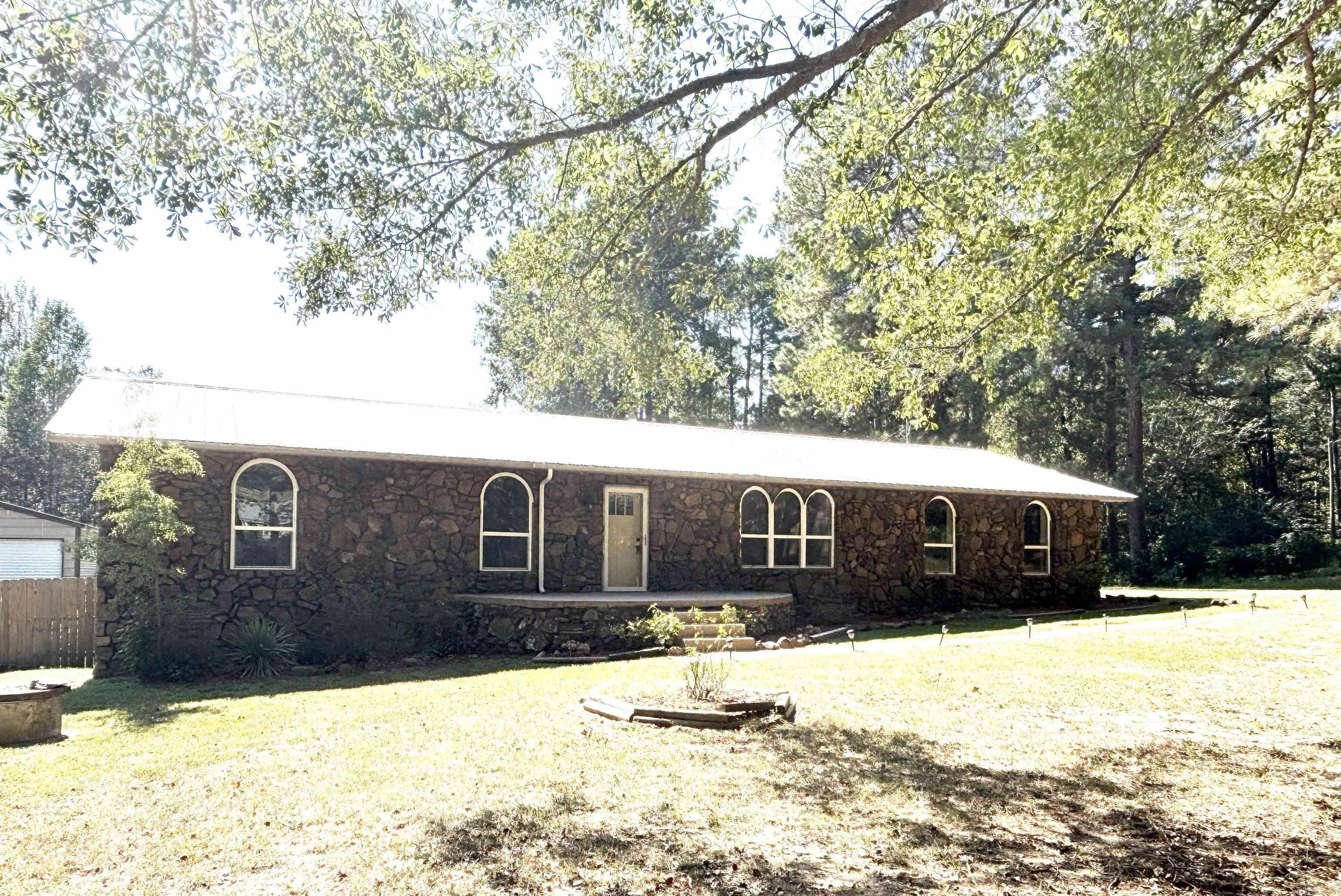 This beautifully remodeled and renovated home is in a Rural Development area & qualifies for 100% financing! Every inch of this home has been renovated! Featuring new paint, both inside and out, Brand New appliances, HVAC, Garage is heated & cooled, Granite countertops throughout, Metal roof, new windows and doors with fenced in back yard. This Amazing location offers quiet country living with a country feel, but is only a short drive to town!